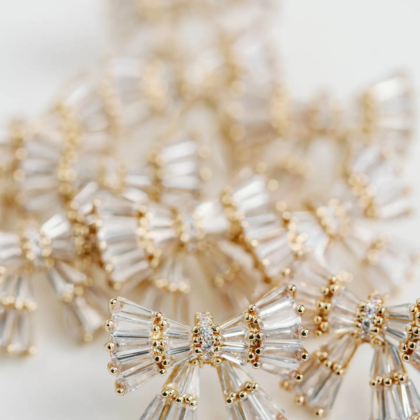 St Armand Gold Sparkler Holiday Statement Stud Bow Earrings